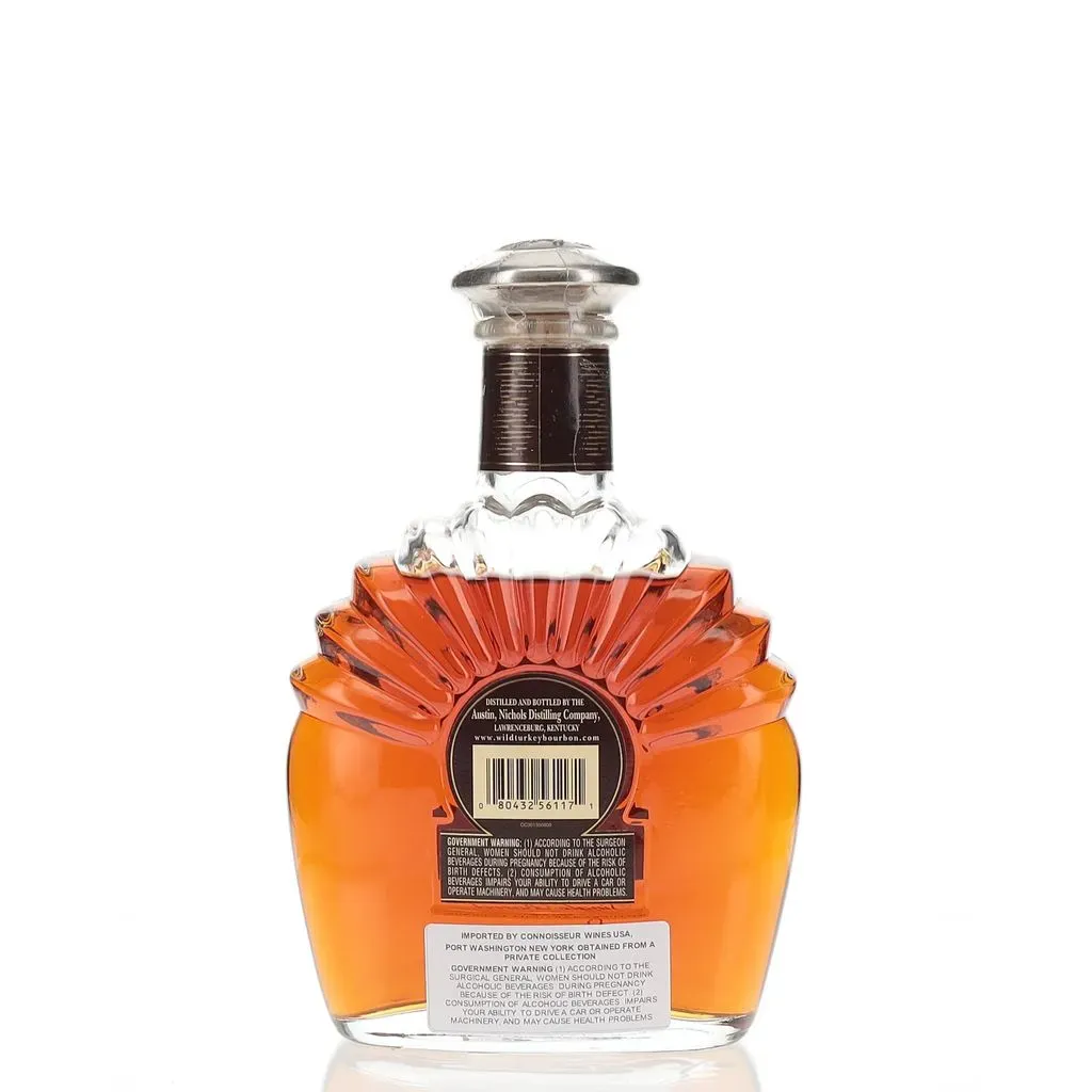 The Wild Turkey Kentucky Spirit with the pewter top, produced from 1994 to 2001, represents a significant and highly sought-after expression in the distillery's history. This single barrel bourbon, bottled at 101 proof (50.5% ABV), was Wild Turkey's answer to the growing premium bourbon market of the 1990s, particularly in response to the success of Blanton's. The distinctive bottle design, shaped like a turkey with fanned feathers, and the weighty pewter stopper made it stand out on shelves and in collections.

What makes the pewter top Kentucky Spirit releases particularly special is their connection to Wild Turkey's heritage. These bottles were often filled with bourbon from Warehouses A, B, and C on the original Tyrone campus, which were personal favorites of Master Distiller Jimmy Russell. The age of the whiskey in these bottles is believed to range from 8 to 14 years, with some early releases potentially containing even older stocks. Tasting notes for these vintage Kentucky Spirits often describe a rich, complex flavor profile featuring the classic Wild Turkey "funk" - a combination of robust oak, vanilla, caramel, and spice, with a distinctive fruity and sometimes medicinal character that sets it apart from other bourbons of the era. Today, these pewter top releases are highly prized by collectors and enthusiasts, not just for their historical significance, but for the quality and unique character of the bourbon they contain.
