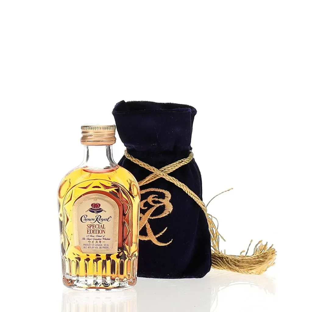 This miniature Crown Royal bottle is a 50ml version of the iconic Canadian whisky, specially created for the Japanese market. Featuring the same high-quality blend of 50 full-bodied Canadian whiskies found in the standard Crown Royal bottles, this petite offering packs a punch of flavor in a compact size.