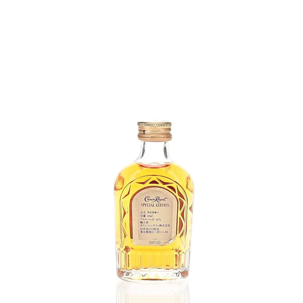 This miniature Crown Royal bottle is a 50ml version of the iconic Canadian whisky, specially created for the Japanese market. Featuring the same high-quality blend of 50 full-bodied Canadian whiskies found in the standard Crown Royal bottles, this petite offering packs a punch of flavor in a compact size.