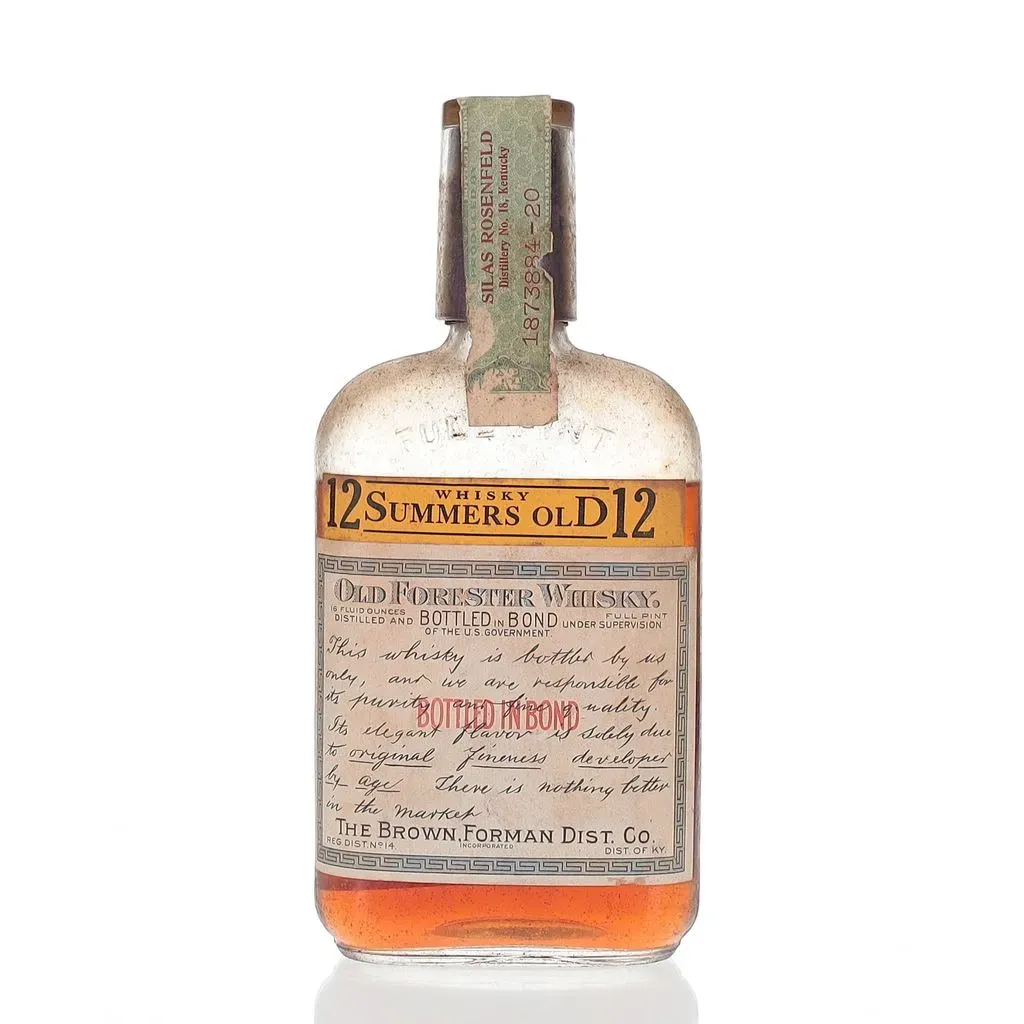 The Old Forester 12 Summers Old Bottled In Bond 1929 is a remarkable snapshot of bourbon history, encapsulating the quality and tradition of one of America's oldest bourbon brands. Bottled in bond under strict government supervision, this whisky adheres to the standards set forth in the Bottled-in-Bond Act of 1897, ensuring its purity and authenticity. The label on this well-preserved bottle proudly declares its 12-year aging process and the commitment of the Brown-Forman Distillery to its craft. The amber color of the whisky hints at its maturity and depth of flavor, likely offering a rich, complex profile typical of bourbons from this era. This bottle is not only a testament to the enduring legacy of Old Forester but also a rare collectible that represents the storied past of American whiskey-making.