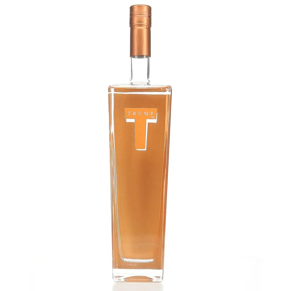 Trump Super Premium Vodka is a distinctive spirit that was once associated with the brand of former U.S. President Donald Trump. Created in Holland by Wanders Distillers, this vodka is crafted from select European wheat and undergoes a meticulous production process.

The vodka is distilled five times, with four of these distillations utilizing activated carbon for enhanced purity. Following distillation, it's rested for six months in stainless steel vats, allowing the flavors to meld and develop complexity.

On the nose, Trump Super Premium Vodka offers dry, earthy scents of grain and paraffin, complemented by subtle notes of jasmine, flowers, moss, and a hint of soot. The palate presents a better-than-average grain focus and viscosity, evolving into an off-dry profile with intense breakfast cereal and biscuit-like flavors. The finish is described as oily/creamy with a snack cracker-like quality.

Launched in 2005 with the slogan "Success Distilled," this vodka was initially promoted as a luxury brand aimed at competing with established premium vodkas. However, despite its initial fanfare, Trump Vodka was discontinued in the United States in 2011 due to poor sales performance. It's worth noting that the brand continues to have a presence in certain international markets, particularly in Israel, where it has found popularity around the Jewish holiday of Passover.