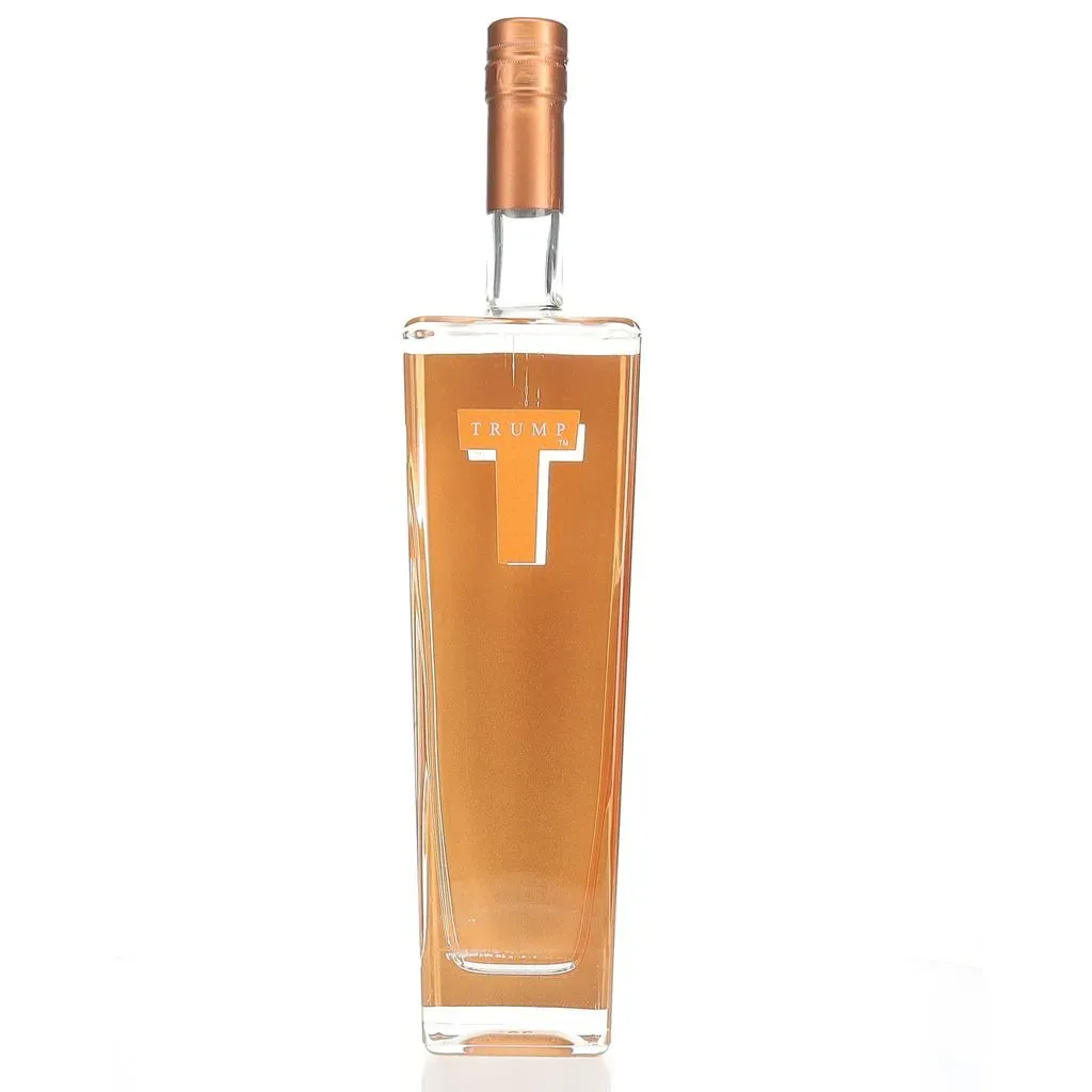 Trump Super Premium Vodka is a distinctive spirit that was once associated with the brand of former U.S. President Donald Trump. Created in Holland by Wanders Distillers, this vodka is crafted from select European wheat and undergoes a meticulous production process.

The vodka is distilled five times, with four of these distillations utilizing activated carbon for enhanced purity. Following distillation, it's rested for six months in stainless steel vats, allowing the flavors to meld and develop complexity.

On the nose, Trump Super Premium Vodka offers dry, earthy scents of grain and paraffin, complemented by subtle notes of jasmine, flowers, moss, and a hint of soot. The palate presents a better-than-average grain focus and viscosity, evolving into an off-dry profile with intense breakfast cereal and biscuit-like flavors. The finish is described as oily/creamy with a snack cracker-like quality.

Launched in 2005 with the slogan "Success Distilled," this vodka was initially promoted as a luxury brand aimed at competing with established premium vodkas. However, despite its initial fanfare, Trump Vodka was discontinued in the United States in 2011 due to poor sales performance. It's worth noting that the brand continues to have a presence in certain international markets, particularly in Israel, where it has found popularity around the Jewish holiday of Passover.