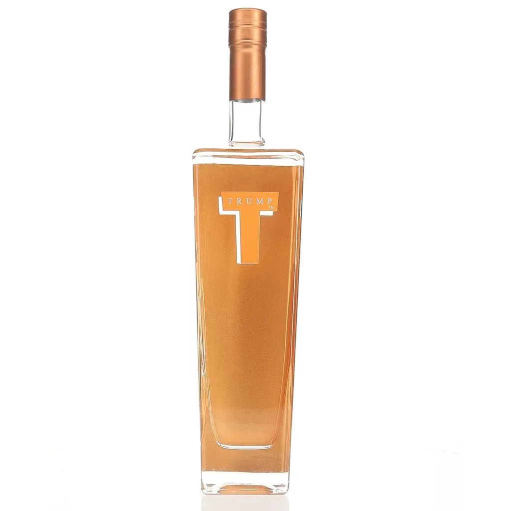 Trump Super Premium Vodka is a distinctive spirit that was once associated with the brand of former U.S. President Donald Trump. Created in Holland by Wanders Distillers, this vodka is crafted from select European wheat and undergoes a meticulous production process.

The vodka is distilled five times, with four of these distillations utilizing activated carbon for enhanced purity. Following distillation, it's rested for six months in stainless steel vats, allowing the flavors to meld and develop complexity.

On the nose, Trump Super Premium Vodka offers dry, earthy scents of grain and paraffin, complemented by subtle notes of jasmine, flowers, moss, and a hint of soot. The palate presents a better-than-average grain focus and viscosity, evolving into an off-dry profile with intense breakfast cereal and biscuit-like flavors. The finish is described as oily/creamy with a snack cracker-like quality.

Launched in 2005 with the slogan "Success Distilled," this vodka was initially promoted as a luxury brand aimed at competing with established premium vodkas. However, despite its initial fanfare, Trump Vodka was discontinued in the United States in 2011 due to poor sales performance. It's worth noting that the brand continues to have a presence in certain international markets, particularly in Israel, where it has found popularity around the Jewish holiday of Passover.