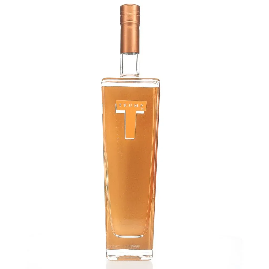 Trump Super Premium Vodka is a distinctive spirit that was once associated with the brand of former U.S. President Donald Trump. Created in Holland by Wanders Distillers, this vodka is crafted from select European wheat and undergoes a meticulous production process.

The vodka is distilled five times, with four of these distillations utilizing activated carbon for enhanced purity. Following distillation, it's rested for six months in stainless steel vats, allowing the flavors to meld and develop complexity.

On the nose, Trump Super Premium Vodka offers dry, earthy scents of grain and paraffin, complemented by subtle notes of jasmine, flowers, moss, and a hint of soot. The palate presents a better-than-average grain focus and viscosity, evolving into an off-dry profile with intense breakfast cereal and biscuit-like flavors. The finish is described as oily/creamy with a snack cracker-like quality.

Launched in 2005 with the slogan "Success Distilled," this vodka was initially promoted as a luxury brand aimed at competing with established premium vodkas. However, despite its initial fanfare, Trump Vodka was discontinued in the United States in 2011 due to poor sales performance. It's worth noting that the brand continues to have a presence in certain international markets, particularly in Israel, where it has found popularity around the Jewish holiday of Passover.