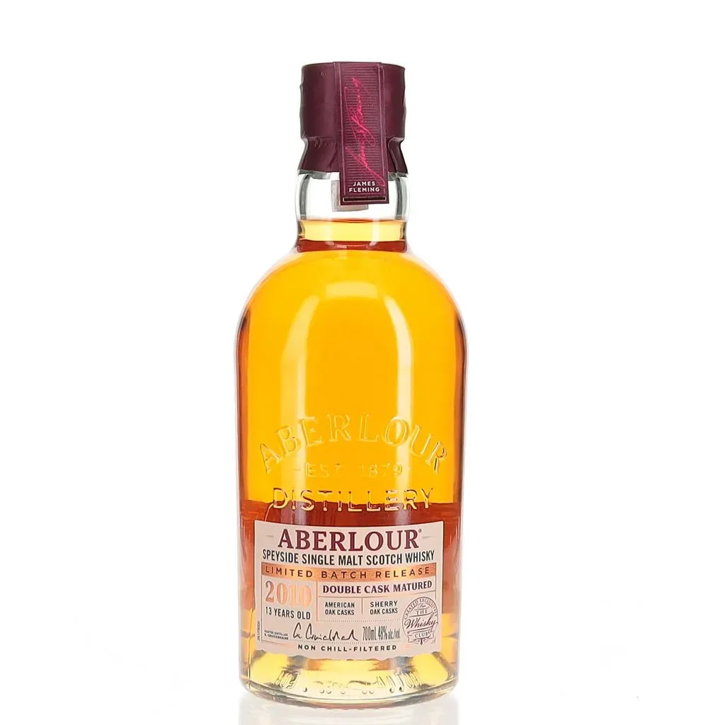 Aberlour's 2010 13 Year Old Double Cask Matured is a limited batch release from this esteemed Speyside distillery, showcasing their mastery in cask maturation. This expression exemplifies Aberlour's dedication to crafting complex and nuanced single malts that reflect the rich heritage of the region.

Distilled in 2010 and aged for 13 years, this whisky undergoes a meticulous double cask maturation process, spending time in both American Oak barrels and sherry casks. This combination allows for a rich and multifaceted flavor profile, where the American Oak imparts classic notes of vanilla and soft fruits, while the sherry casks contribute depth with hints of dried fruit and nutty characteristics.

Bottled at 48% ABV, this limited batch release offers an approachable yet flavorful experience. On the nose, one can expect a harmonious blend of sweet orange, ginger marmalade, and a medley of fruits including apricots and peaches, underscored by abundant vanilla notes. The palate presents a full-bodied experience with flavors of soft red apple, peaches, hazelnuts, and vanilla toffee. The finish is characteristically long, sweet, and indulgent, reflecting the whisky's careful maturation and exceptional cask selection.