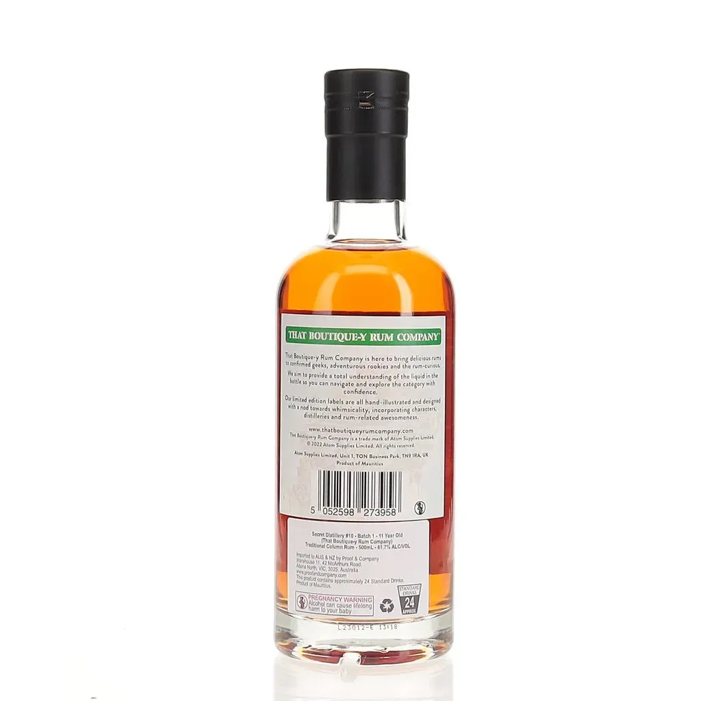 That Boutique-y Rum Company's "Secret Distillery #10" release is an intriguing addition to their lineup of mysterious and carefully curated rums. This particular expression hails from an undisclosed distillery, adding an element of intrigue for rum enthusiasts and collectors alike.

The rum is presented in That Boutique-y Rum Company's signature style, featuring a whimsical label design that often provides subtle clues about the rum's origin or characteristics. While the exact details of the distillery remain a secret, the bottle likely offers tasting notes and production information to guide the drinker's experience.

As with many of That Boutique-y Rum Company's releases, "Secret Distillery #10" is likely bottled at a higher proof to showcase the rum's full flavor profile. The company is known for selecting unique and high-quality rums, so this expression can be expected to offer a complex and enjoyable tasting experience. Rum aficionados may find themselves engaged in spirited debates and tastings, attempting to uncover the true identity of the distillery based on the rum's flavor profile and characteristics.
