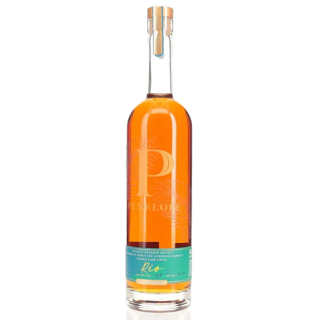 Penelope Rio Bourbon is an innovative and exciting release from Penelope Bourbon's Cooper Series, which explores unique cask finishes from around the world. This 2024 edition showcases a double cask finish, combining American honey barrels and Brazilian Amburana wood to create a truly distinctive flavor profile.

Bottled at 98 proof (49% ABV), this straight bourbon whiskey offers a captivating sensory experience. On the nose, it presents enticing aromas of sweet honey, burnt wood, cinnamon potpourri, and cedar, with hints of burnt orange rind and dark fruit. The palate is equally complex, featuring flavors reminiscent of Greek baklava, charred marshmallow, and a harmonious blend of sweet and savory notes.

As the whiskey develops, it reveals layers of graham cracker, cinnamon stick, cream soda, and roasted malt. The finish is full-bodied and lingering, with a perfect balance of sweetness and spice. Penelope Rio Bourbon manages to improve upon its already popular predecessor, offering bourbon enthusiasts a unique tasting experience that captures the vibrant spirit of Brazil.
