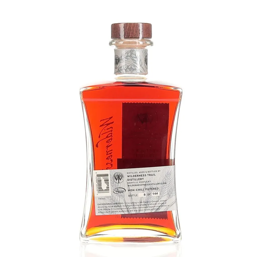 Barrel #767775 is a BAXUS-exclusive family reserve high-rye bourbon from the Wilderness Trail distillery, bottled at cask strength of 58.5% ABV. This barrel was selected at the distillery by members of the BAXUS team, as well as two community members chosen to join the trip based on the bottles of bourbon they had listed in their collections on the app. The legendary whiskey writer David Tao also participated in selecting this bourbon, which was chosen from among seven other options as the most outstanding of the lot. This particularly small barrel yielded only 144 bottles, rather than the standard 200, further highlighting its concentrated flavor profile. It was matured for 5 years in an ISC Classic #4 charred barrel and fermented with yeast strain 927. Wilderness Trail is one of the most innovative distilleries in the world, particularly renowned for its focus on yeast due to its long history as fermentation experts. In 2006, Dr. Pat Heist and Shane Baker founded FermSolutions, a consulting firm that created unique yeast strains and provided technical assistance to distilleries and breweries across the United States. After seven years, the firm had established itself so well in Kentucky distilling circles that Heist and Baker decided to set up their own distillery. Wilderness Trail Distillery was built in 2013 in Danville, initially using a pot still before expanding twice to ramp up production. The founders initially focused on contract distillation for other brands but later began producing barrels for themselves, with varying mash bills, including a high-rye, wheated, and traditional rye mash bill. Their industry-leading experience in fermentation innovation means the yeast strain used for each mash is just as important as the grains or stills used. Whiskey is fundamentally made of water, yeast, and grain, with most modern distillers primarily adjusting the grain to create new products. Wilderness Trail's fundamentally scientific approach means these different yeast strains can create various types of spirits using the same mash bill, with one potentially being fruit-forward while another is heavier and earthier in character. Typically choosing to release their spirits around the 4- to 6-year mark, their expertise in all aspects of production has allowed them to create a flavor-first style of whiskey at a relatively young age. This innovative brilliance caught the eye of the large Italian drinks company Campari, which purchased a 70% stake in Wilderness Trail in October 2022, with the final 30% to be purchased in 2031. The deal was reportedly valued at $420 million, signifying just how valuable the new Kentucky producer has become in the market.