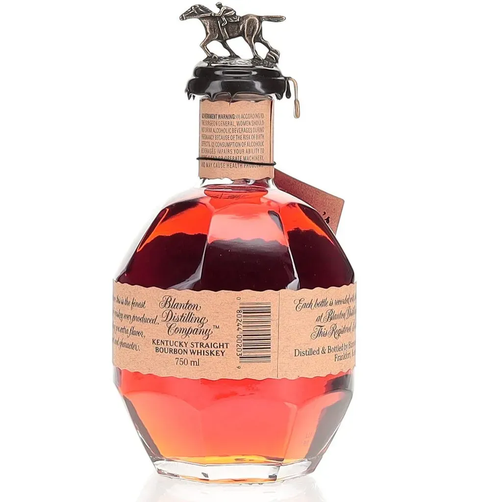 Blanton's Single Barrel Bourbon is a celebrated expression that holds the distinction of being the first single-barrel bourbon ever produced, introduced in 1984 by Buffalo Trace Distillery. Known for its rich heritage and craftsmanship, Blanton's has become a sought-after favorite among bourbon enthusiasts.

Each bottle of Blanton's comes from a single barrel, resulting in unique flavor profiles that can vary from one release to another. Typically bottled at 93 proof, this bourbon is aged in charred American white oak barrels, allowing it to develop a complex character over time. 

On the nose, Blanton's Single Barrel offers inviting aromas of honey, caramel, and ripe fruit, complemented by hints of citrus and spice. The palate is full-bodied and vibrant, featuring flavors of cinnamon, vanilla, and dark chocolate. A subtle spiciness adds depth, while the finish is smooth and lingering, leaving behind notes of oak and sweet toffee.

Blanton's iconic packaging includes a distinctive bottle shape and a horse-and-jockey stopper that has become a collector's item in its own right. With its combination of quality, rarity, and craftsmanship, Blanton's Single Barrel remains a benchmark for bourbon aficionados and continues to capture the hearts of whiskey lovers around the world.


